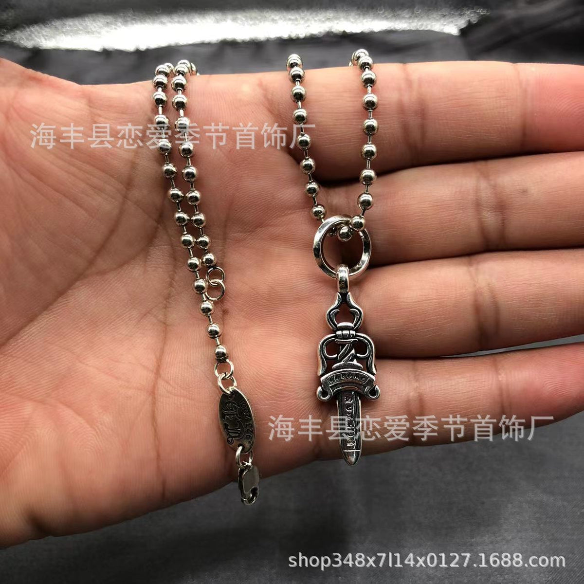 Chrome Hearts heart-shaped sword cross pendant